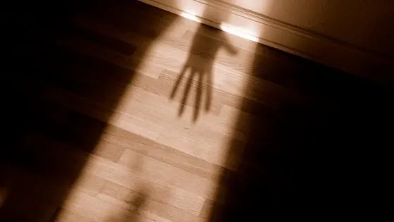 Image of a hand shadow representing negative energy